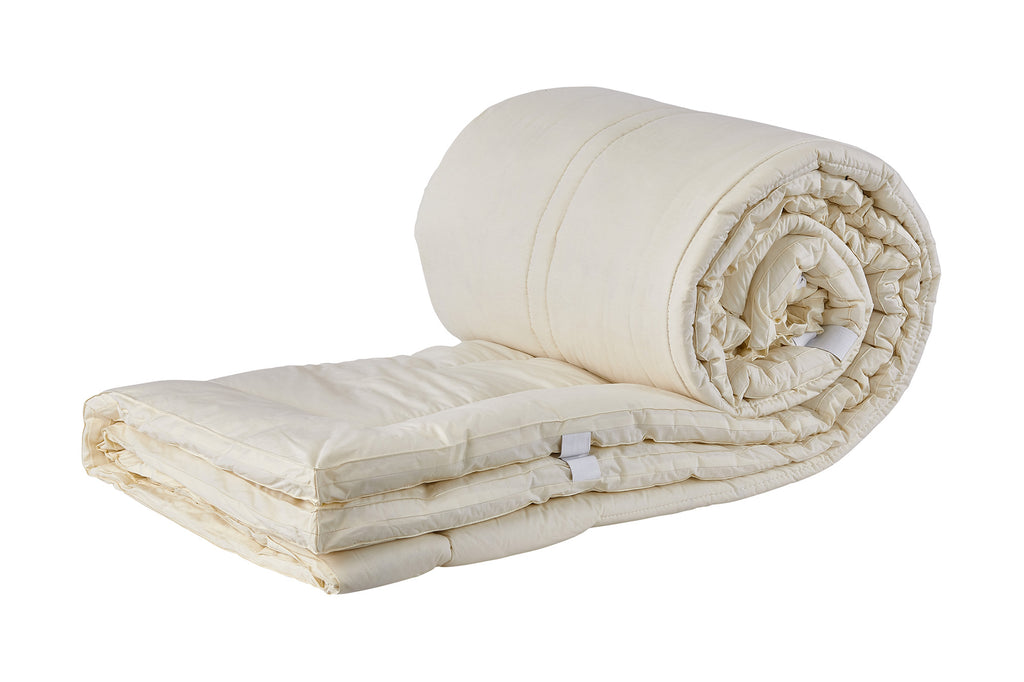 Purevana 1-inch merino wool mattress topper rolled up — compact storage and easy setup