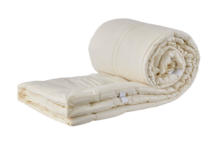 Purevana 1-inch merino wool mattress topper rolled up — compact storage and easy setup
